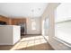 Bright kitchen featuring stainless steel appliances and ample natural light from the sliding glass door at 11029 Ardglass Ct, Charlotte, NC 28213