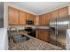 Updated kitchen with granite counters, stainless appliances, and ample cabinet space at 11029 Ardglass Ct, Charlotte, NC 28213