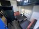 Compact living room with dinette and interior storage at 114 Dove Ln, New London, NC 28127