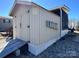 Outdoor shed with double doors providing ample storage space and functionality at 114 Dove Ln, New London, NC 28127
