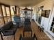 Spacious outdoor patio with comfortable seating, perfect for relaxing and entertaining while enjoying the serene surroundings at 117 Badin Lake Cir, New London, NC 28127