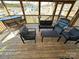 Inviting outdoor seating area with comfortable chairs, a table, and scenic views for relaxation and enjoyment at 117 Badin Lake Cir, New London, NC 28127