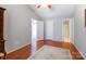Bedroom with hardwood floors, light gray walls, and white trim at 1362 Copper Creek Ln, Fort Mill, SC 29715