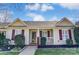Charming single-story home featuring manicured landscaping and a welcoming front porch at 1362 Copper Creek Ln, Fort Mill, SC 29715