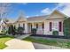 Charming single-story home with manicured lawn and inviting curb appeal at 1362 Copper Creek Ln, Fort Mill, SC 29715
