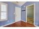 Bright foyer with wood flooring, blue walls and white trim at 1362 Copper Creek Ln, Fort Mill, SC 29715