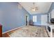 Bright living room features vaulted ceiling, natural light and wood-look floors at 1362 Copper Creek Ln, Fort Mill, SC 29715