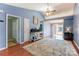 Bright living room features vaulted ceiling, natural light and wood-look floors at 1362 Copper Creek Ln, Fort Mill, SC 29715