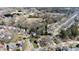 Neighborhood aerial showcasing well-maintained homes, mature trees, and community layout at 16032 Hollingbourne Rd, Huntersville, NC 28078