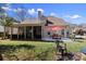 Expansive backyard features a patio with an outdoor dining area, a grill and a relaxing atmosphere at 16032 Hollingbourne Rd, Huntersville, NC 28078