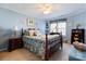 Spacious bedroom offers a ceiling fan, natural light and neutral wall-to-wall carpeting at 16032 Hollingbourne Rd, Huntersville, NC 28078