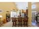 Bright kitchen with bar stool seating at the kitchen island at 16032 Hollingbourne Rd, Huntersville, NC 28078