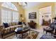 Inviting living room with a vaulted ceiling, comfortable seating, and a view into the entryway at 16032 Hollingbourne Rd, Huntersville, NC 28078