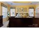 Bright bedroom with tray ceiling and shutters at 16032 Hollingbourne Rd, Huntersville, NC 28078