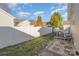 Fenced-in backyard with landscaping and stone pavers at 1720 Dewberry Pl, Salisbury, NC 28146