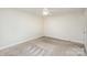 Neutral-toned bedroom featuring carpet flooring and natural light at 1720 Dewberry Pl, Salisbury, NC 28146