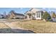 A charming single-story home boasting a covered front porch, beautiful stone accents, and a well-kept lawn at 1720 Dewberry Pl, Salisbury, NC 28146