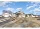 Charming single-story home featuring a covered front porch with stone accents and a well-maintained front yard at 1720 Dewberry Pl, Salisbury, NC 28146