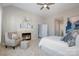 Comfortable bedroom with fireplace, accent chair, and plush seating at 20105 Chapel Point Ln, Cornelius, NC 28031