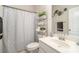 Cozy bathroom with stylish decor and well-organized storage solutions at 205 Falls Cove Dr, Troutman, NC 28166