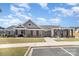 Community center with a well-maintained facade, welcoming entrance, and accessible parking at 205 Falls Cove Dr, Troutman, NC 28166