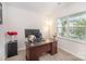 Bright office with desk, globe, and natural light, creating a productive workspace at 205 Falls Cove Dr, Troutman, NC 28166