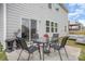 Relaxing patio area with outdoor seating, ideal for gatherings and enjoying the backyard at 205 Falls Cove Dr, Troutman, NC 28166