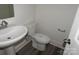 Cozy powder room with modern fixtures and a pedestal sink at 232 Sugar Hill Rd, Troutman, NC 28166