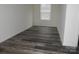 Bedroom featuring a window and durable floors at 248 Mills Ave, Troutman, NC 28166