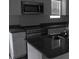 Kitchen featuring granite countertops, stainless steel appliances, and ample cabinet space at 248 Mills Ave, Troutman, NC 28166