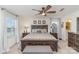 Serene main bedroom with a king-sized bed, soft lighting, and elegant decor for a relaxing retreat at 2638 Trinity St, Monroe, NC 28110