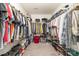 A large walk-in closet with plenty of shelving and storage space at 2638 Trinity St, Monroe, NC 28110