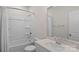 Clean bathroom with a shower-tub combo, vanity, and large mirror at 3012 Seville St, Charlotte, NC 28214
