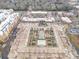 Aerial view of rooftop pool and courtyard, showcasing the building's amenities and architectural design at 3920 Sharon Rd # 208, Charlotte, NC 28211