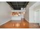 Open floor plan seamlessly connects the kitchen and living area, creating an ideal space for entertaining and modern living at 3920 Sharon Rd # 208, Charlotte, NC 28211