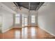 Bright and airy living room with hardwood floors and lots of natural light creating a warm and inviting atmosphere at 3920 Sharon Rd # 208, Charlotte, NC 28211