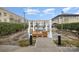Chic outdoor lounge area offering a peaceful retreat with comfortable seating and stylish ambiance at 3920 Sharon Rd # 208, Charlotte, NC 28211