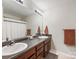 Bright bathroom featuring a double sink vanity with modern fixtures and a neutral color palette at 3949 Picasso Ct, Charlotte, NC 28205