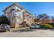 Attractive condo building with brick and siding, balconies, and convenient parking at 3949 Picasso Ct, Charlotte, NC 28205