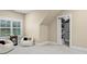 Bright bedroom featuring a cozy reading nook and a closet for storage at 462 Barber Loop, Mooresville, NC 28117
