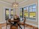 Charming breakfast nook with large window overlooking the pool and backyard at 462 Barber Loop, Mooresville, NC 28117