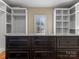 Large walk-in closet with custom built-ins and granite countertop at 462 Barber Loop, Mooresville, NC 28117
