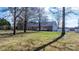 Backyard view of home with a metal roof, white fence, and deck at 468 White Oak Branch Rd, Statesville, NC 28625