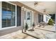 Inviting front porch with ceiling fans and seating, offering a relaxing outdoor space and enhancing curb appeal at 468 White Oak Branch Rd, Statesville, NC 28625