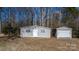 Two storage sheds sit among the trees at 468 White Oak Branch Rd, Statesville, NC 28625