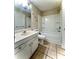 Clean bathroom features a shower and tub combo, white cabinets, and a white sink at 5810 Hunting Ridge Ln # C, Charlotte, NC 28212
