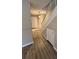 Inviting entryway with wood flooring and stairs leading to the upper level at 5810 Hunting Ridge Ln # C, Charlotte, NC 28212