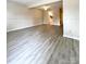Expansive living room space with sleek flooring and neutral tones at 5810 Hunting Ridge Ln # C, Charlotte, NC 28212