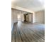 Spacious living room with modern flooring and an open floor plan at 5810 Hunting Ridge Ln # C, Charlotte, NC 28212