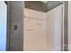 Shower stall featuring built-in shelving at 828 Carver St, Shelby, NC 28152